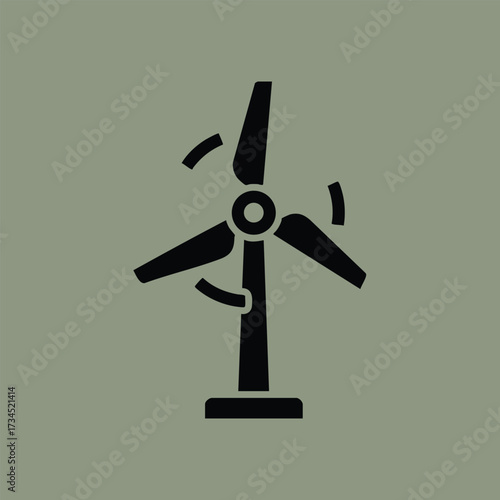 Close-up of a black wind turbine on a muted green symbolizing renewable energy and sustainable power generation