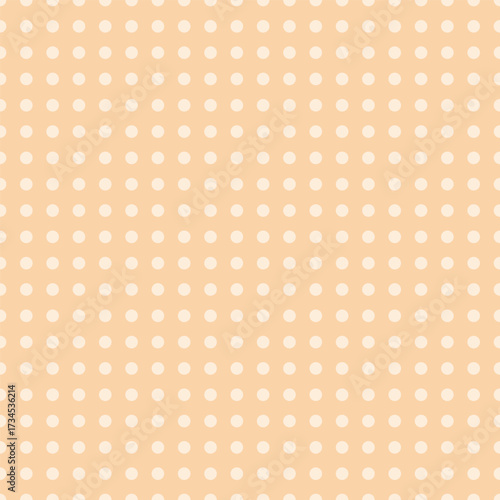 A seamless pattern featuring cream polka dots arranged in a neat grid on a soft peach background. Great for packaging, textiles, wallpaper, and baby items.