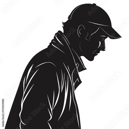 Silhouette of a man wearing a baseball cap and jacket looking down