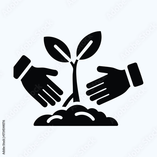 Two hands nurturing a young plant emerging from the soil symbolizing growth, sustainability, and environmental care