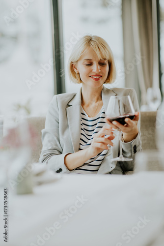 Woman enjoying a glass of r...