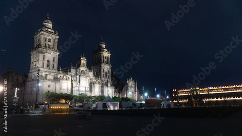 The illuminated Metropolitan Cathedral in Mexico City at night. This historic colonial building sits at the heart of the Zócalo and stands as a symbol of Mexican heritage.