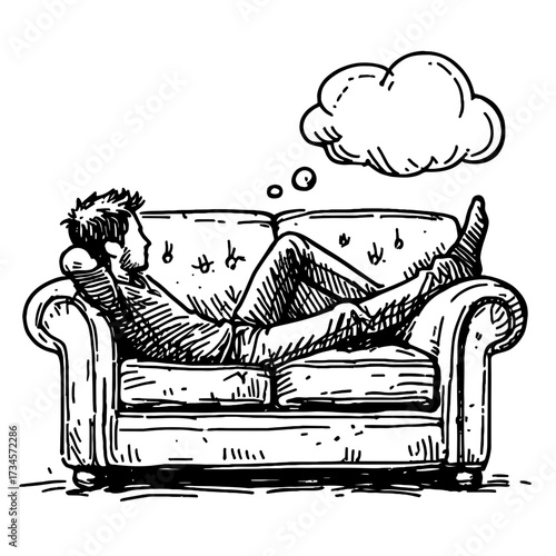 Man relaxing on a sofa and daydreaming indoors  