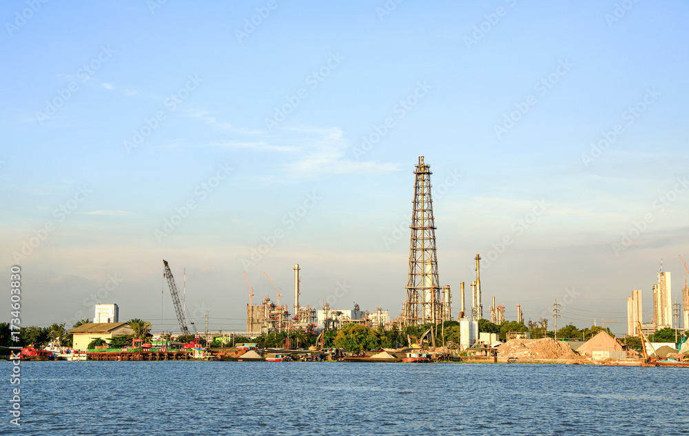 Obraz premium panorama view of Oil and gas industry, factory - petrochemical plant, refinery and transportation under sun light whit beautiful blue sky, Bang jak, Bangkok, Thailand.