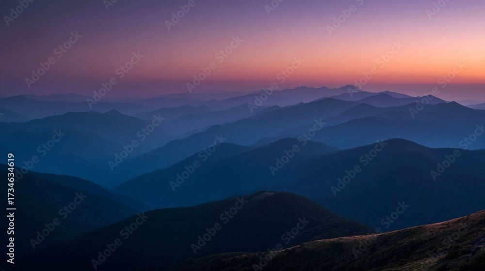 Obraz premium Majestic mountain range at sunrise