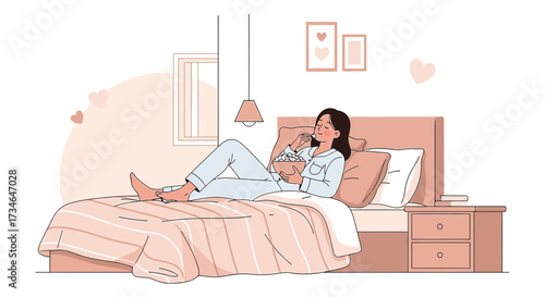 A cozy night in: Young woman relaxing in bed with popcorn and enjoying downtime in her bedroom