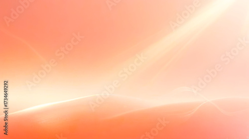 Soft glowing abstract background with warm orange and yellow hues and gentle light streaks