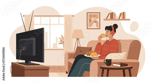 Cozy evening at home: A woman enjoying tacos while watching TV on the couch