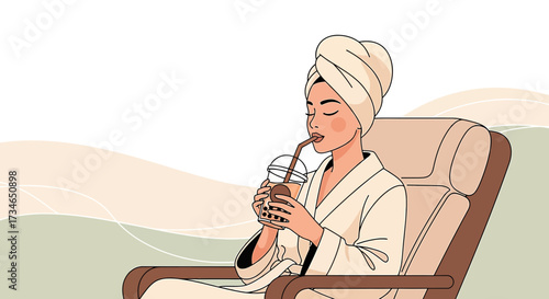 Elegant woman enjoying a refreshing bubble tea moment in a relaxing spa environment