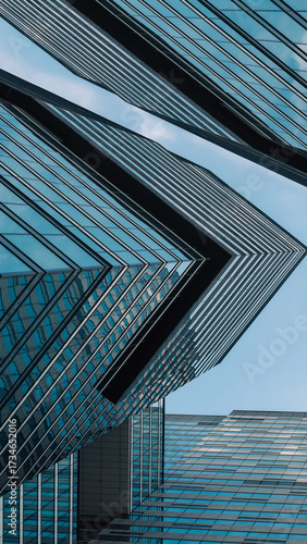 mirrored windows of the facade of an office building
