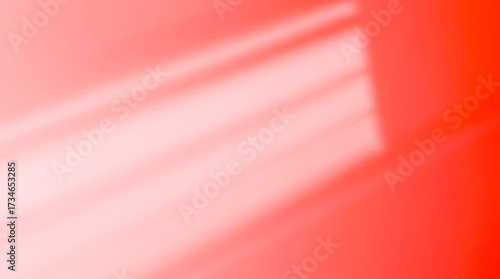 Abstract background with soft diagonal light streaks and a gradient of warm red and pink tones