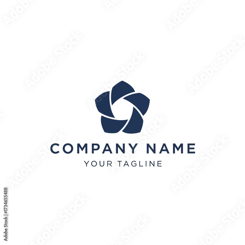A modern, minimalist logo design featuring a blue pentagonal shape resembling a camera shutter or aperture, with placeholder text for company name and tagline.