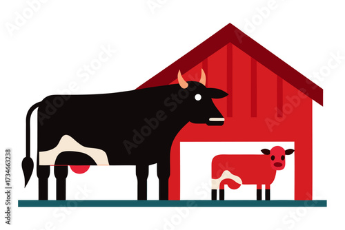 A domestic cow with calf in a barn