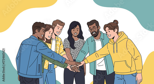Diverse group of young professionals putting hands together symbolizing unity