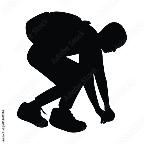 Silhouette of a person bending over, possibly picking something up or gardening