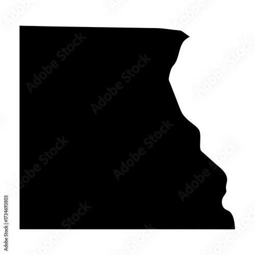 Abstract silhouette of a geographic shape with irregular edge in black and white