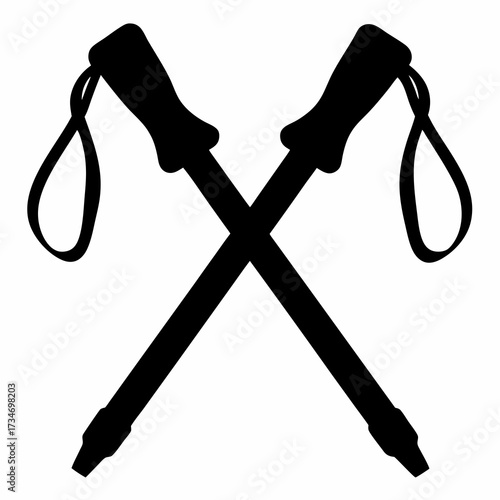 Silhouette of crossed trekking poles with hand straps and tapered ends