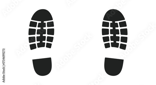 Black footprints on a white background showcasing sole pattern details
