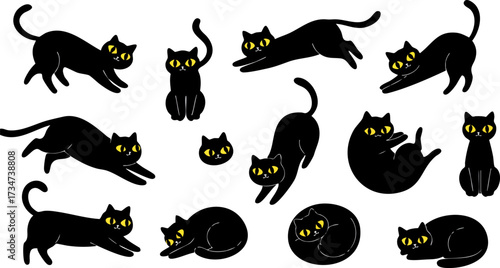 Silhouetted black cats with glowing yellow eyes peering from the darkness at night
