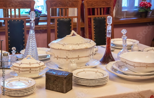 A table set with vintage china dishes for lunch