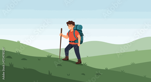 A cheerful hiker is climbing uphill with a backpack and a walking stick under a blue sky