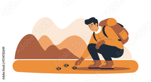 A hiker examines animal tracks in the wilderness during an outdoor adventure