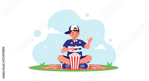 Boy Enjoying Popcorn Outdoors On Blanket During Day Time Fun Activity
