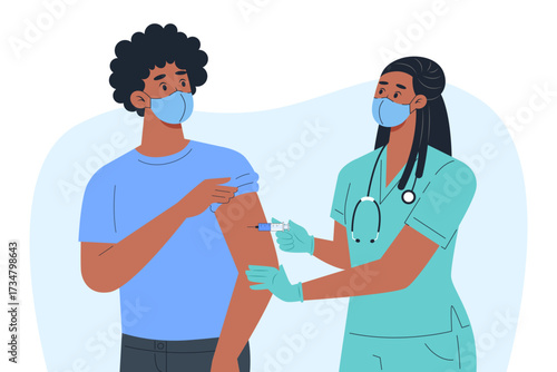 Nurse giving vaccine to patient with mask
