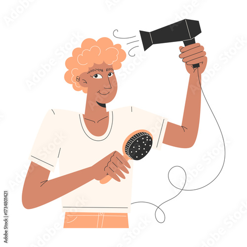 Person drying curly hair with hairdryer and brush
