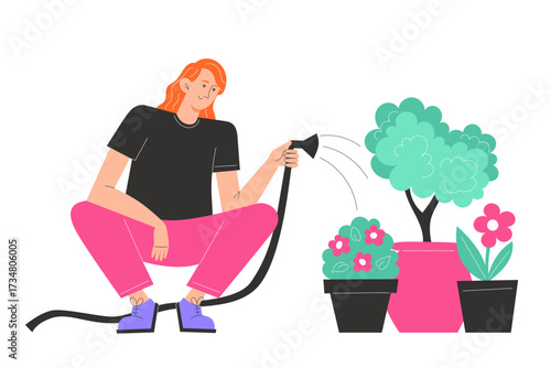 Person watering potted plants with a hose