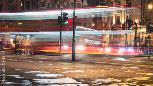 Canvas Print London Streetbat Night with Light Trails of Traffic and Reflections on Pavement