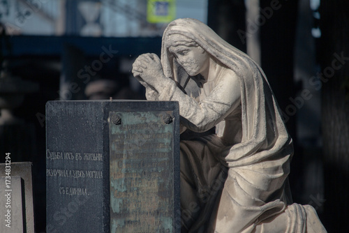 statue of virgin  in cemetery in Saint-Petersburg Russia
