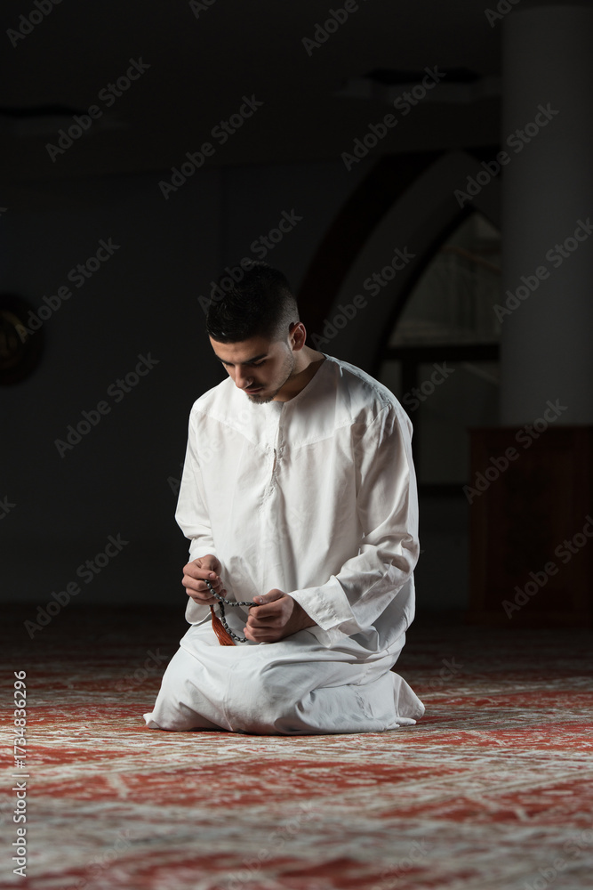 Fototapeta premium Muslim Man Praying At Mosque
