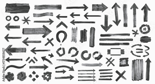 A large collection of hand-drawn grunge arrows, lines, and shapes in monochrome color