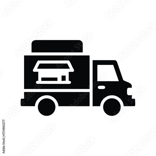 Silhouette of a mobile food truck with service window and storage compartment on a plain