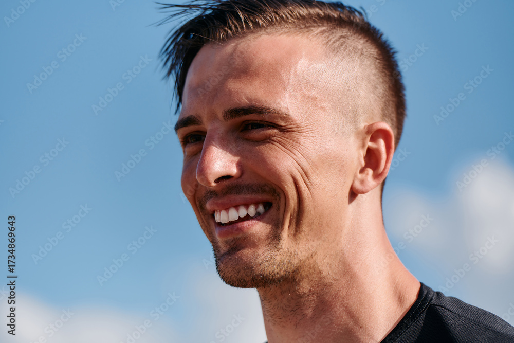 Fototapeta premium Post Run Tranquility Close-Up Portrait of a Man Finding Peace After Intense Training