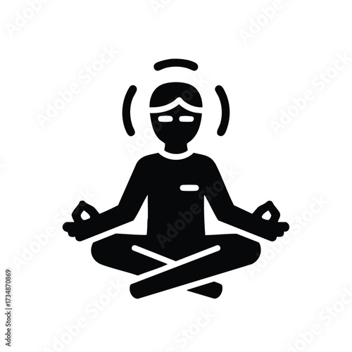 Serene person practicing meditation in a cross-legged seated position with eyes closed and hands resting on knees in a peaceful environment