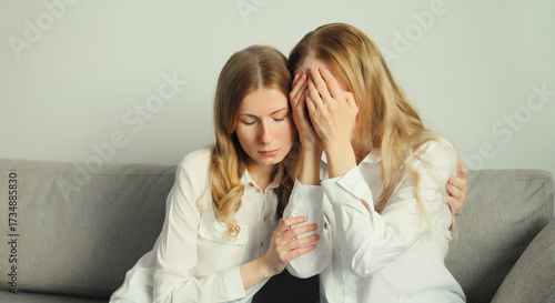 Canvas Print Upset offended caucasian two women, mature mother or sister and adult daughter t