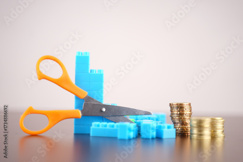 concept photo of cost cutting or benefit deduction