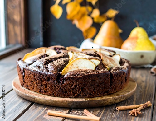 Chocolate pear cake on wooden platter