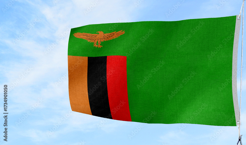 Fototapeta premium Respectful folded Zambia national flag placed on a surface — suitable for memorial and ceremonial themes.