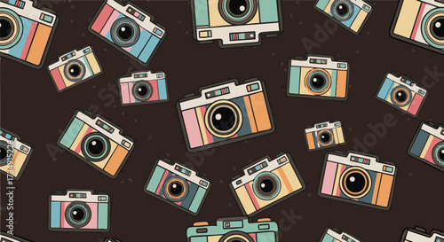 A seamless pattern of colorful retro cameras illustrated in a flat, pop art style