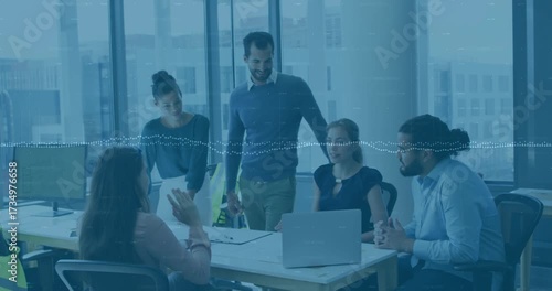 Business leader raising green marker driving discussion and animating chart rising on table