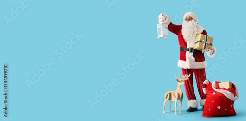 Santa Claus with gift, lant...