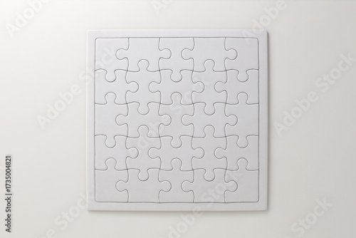 white puzzle pieces on white