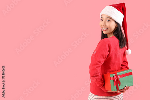 Young beautiful Asian woman...