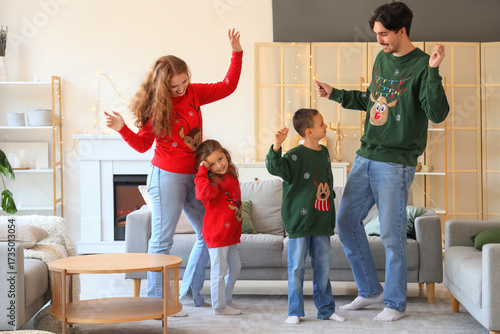 Happy family in warm sweate...