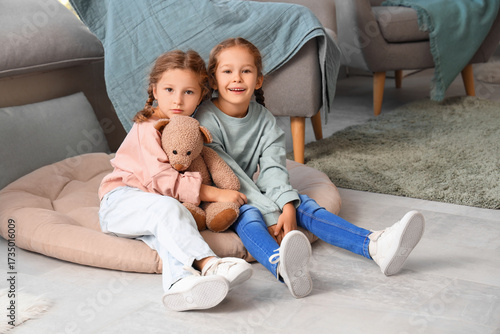 Cute little girls with toy ...