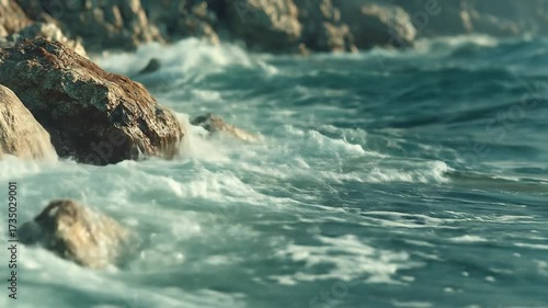 Ocean waves crashing on rocks