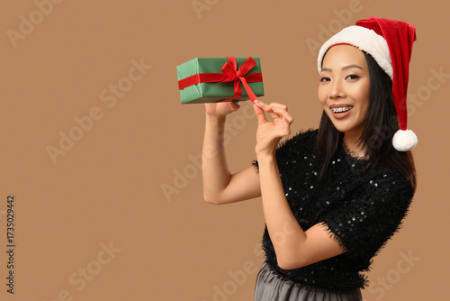 Happy young Asian woman in ...